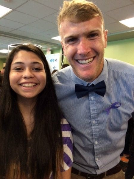 Got to love the smile on Gracie's face. This is Connor Tobin. The player she most wants to be like on the field.