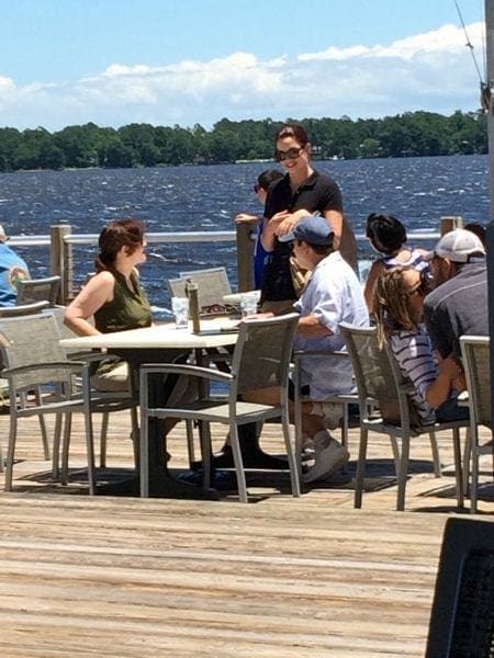 Here is our waitress taking a order at another table.