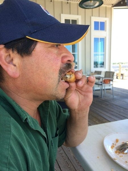 Raul eating my lunch Persimmons
