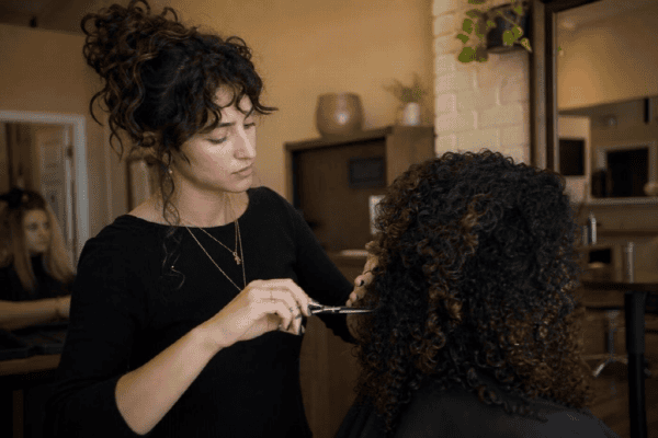 Why Your Curly Hair Looks Different After Every Haircut and How to Prevent It